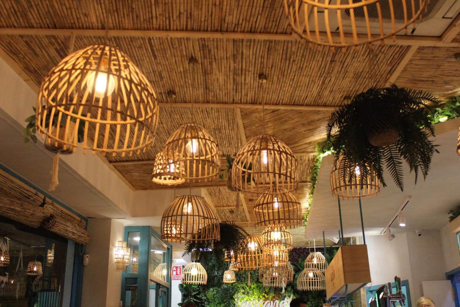 Warm interior illuminated by decorative pendants